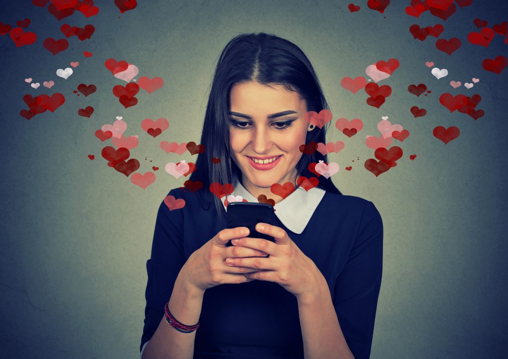 woman in love texting