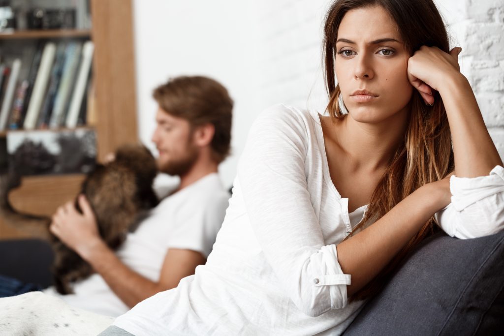 woman in relationship lost in thought