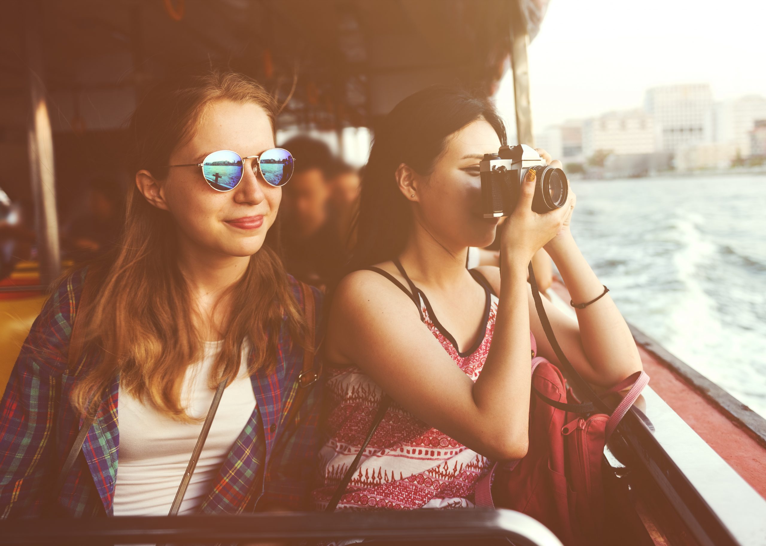 woman with friend on a boat