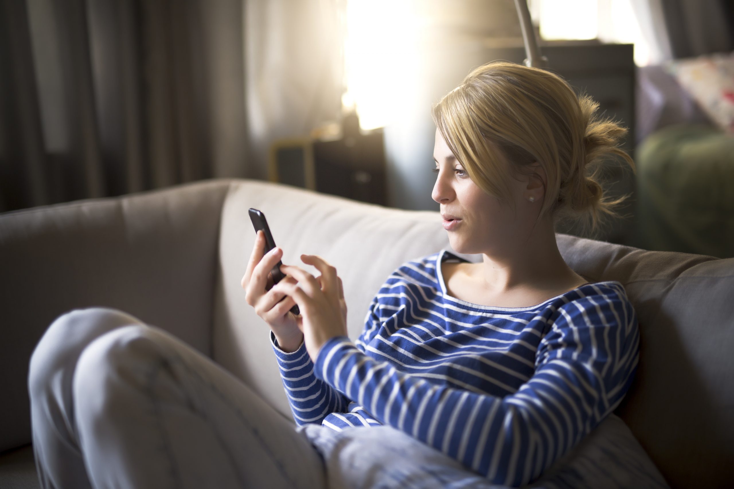 woman checking her phone