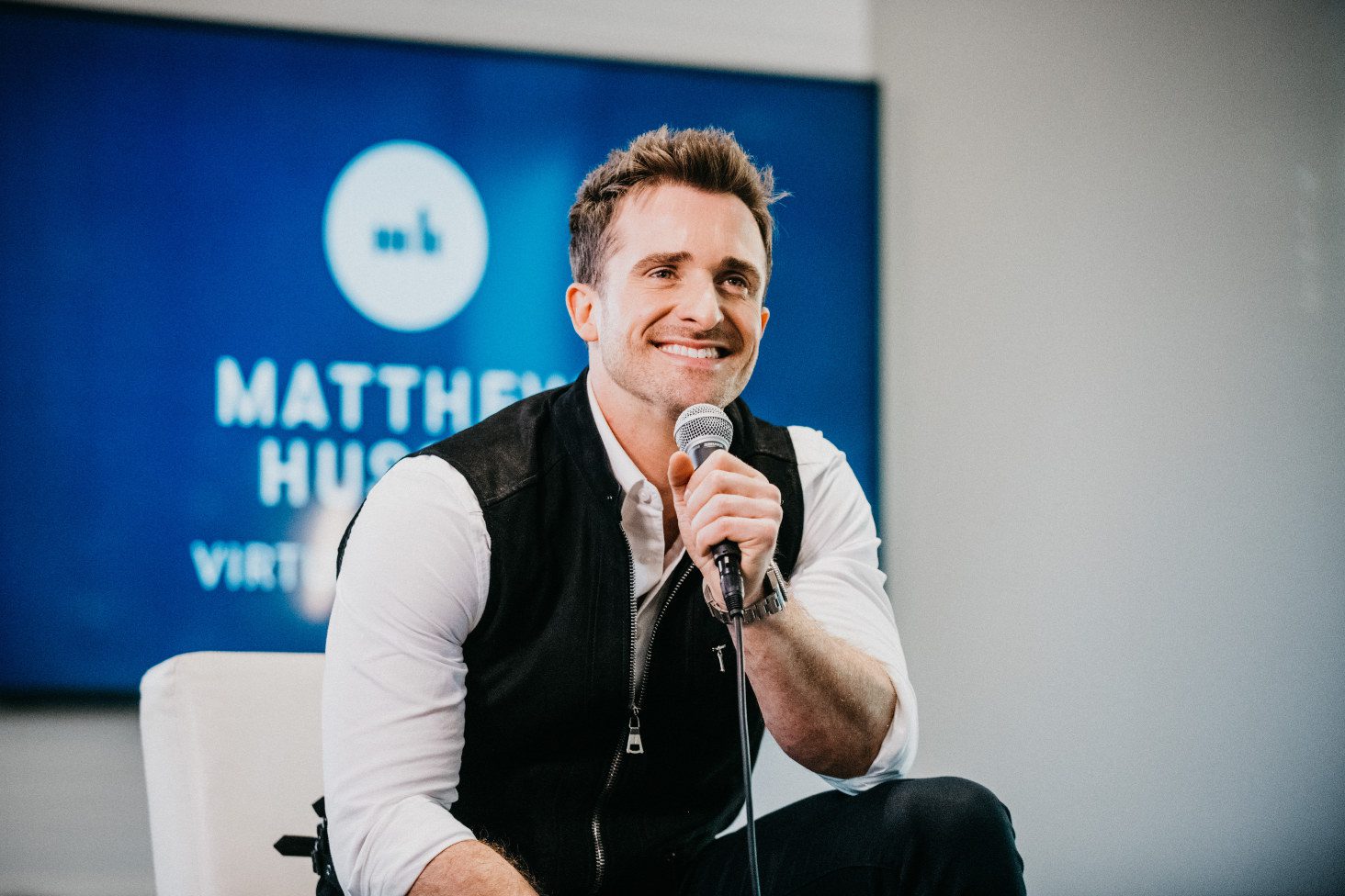 Matthew Hussey interview with microphone
